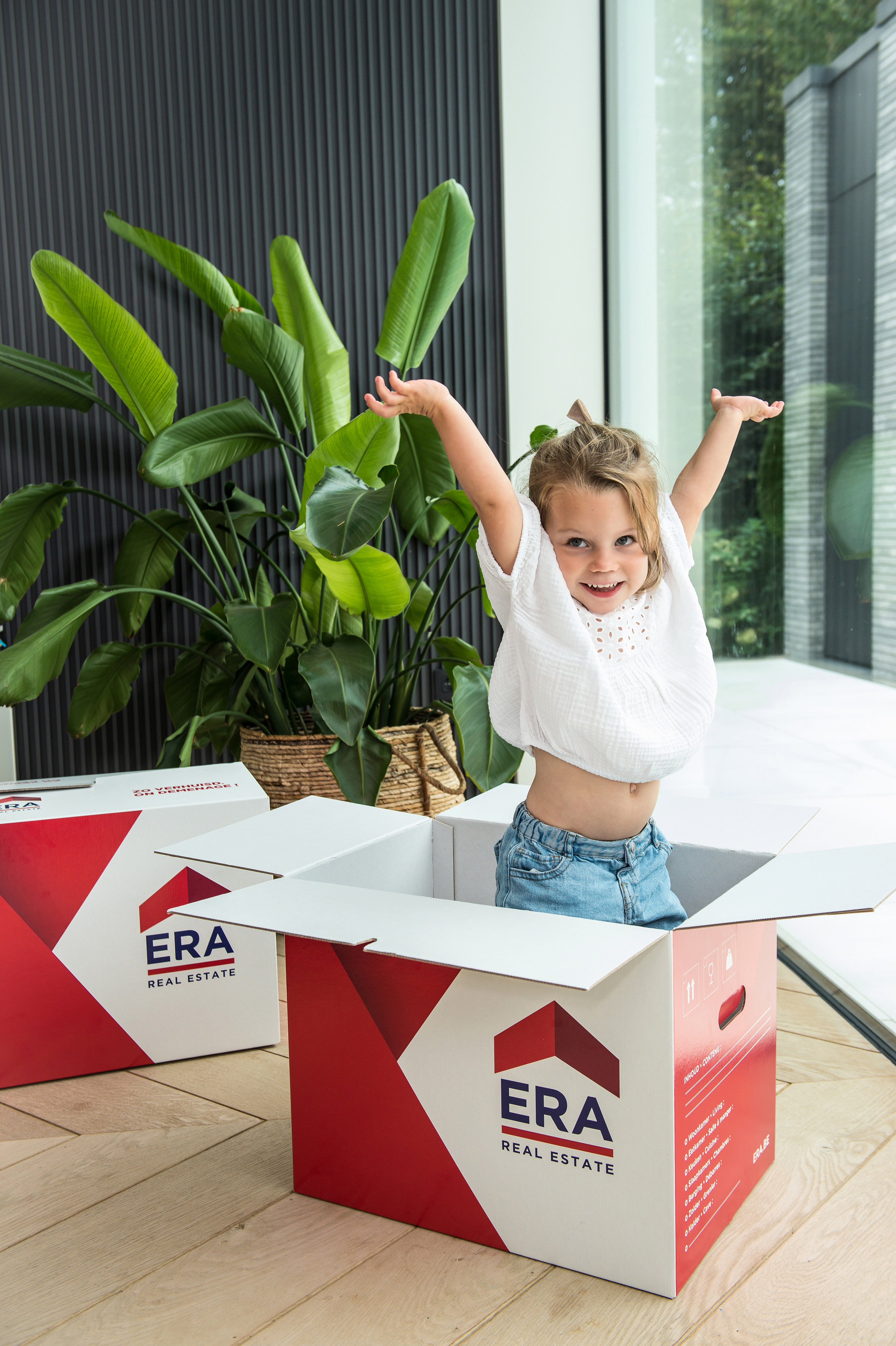 Child jumps out of a moving box