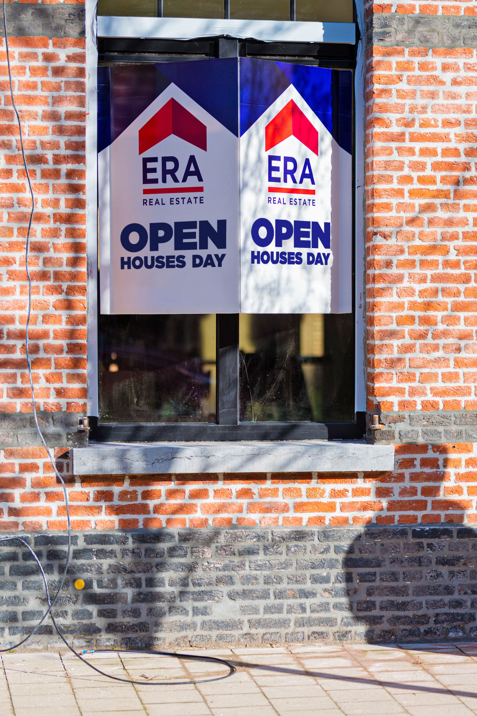 Buyers looking at house during the ERA Open Houses Day.