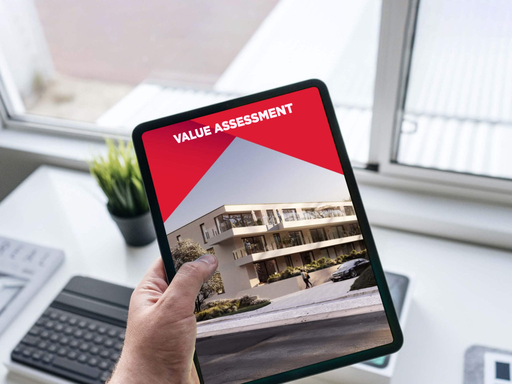 Someone views the ERA Valuation on a tablet.
