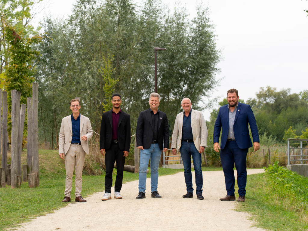 ERA brokers side-by-side outside.